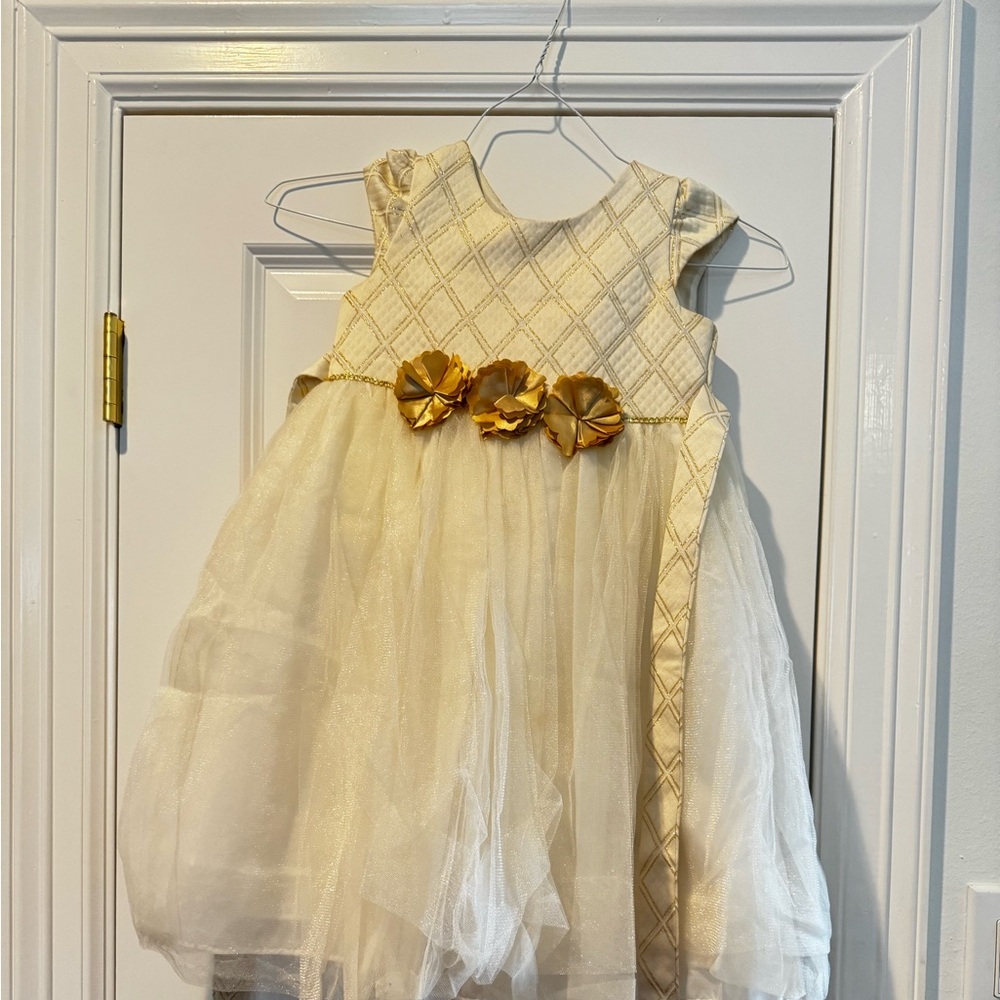 A designer dress for young girls for parties and holiday season size 5 .